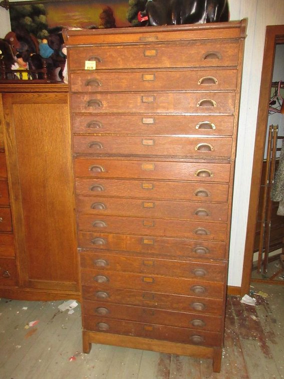 Antique J.M. Harrell 15-drawer oak stacker cabinet (to be removed from second story by buyer)