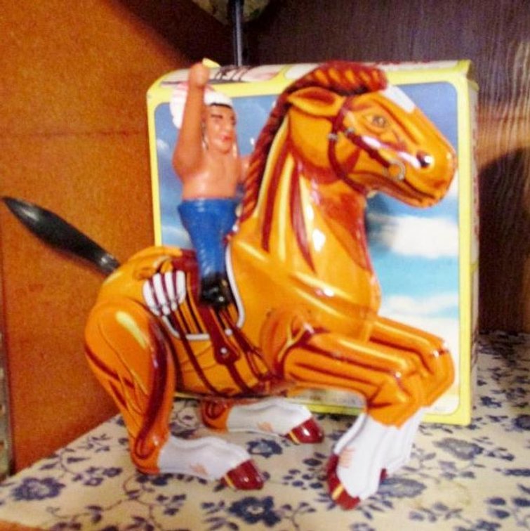 MTU tin wind-up Indian on Horse