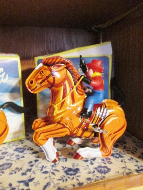 MTU tin wind-up Cowboy on Horse