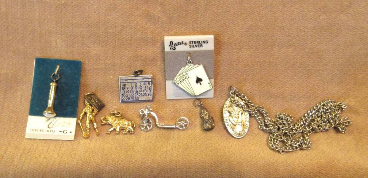 (8) Sterling charms