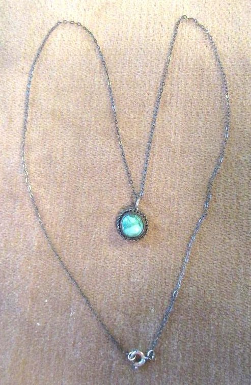 Sterling necklace with green stone pendant
