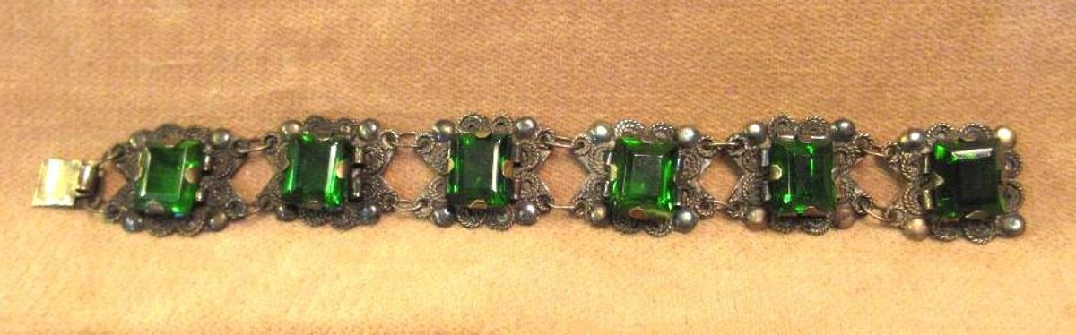 Antique silver bracelet with green stones