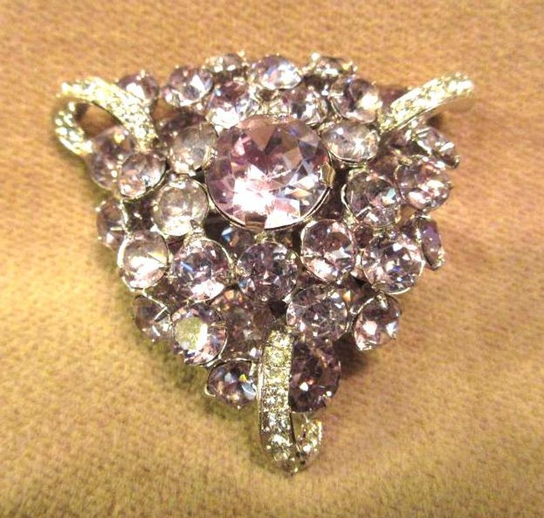 Eisenberg broach with clear and purple stones