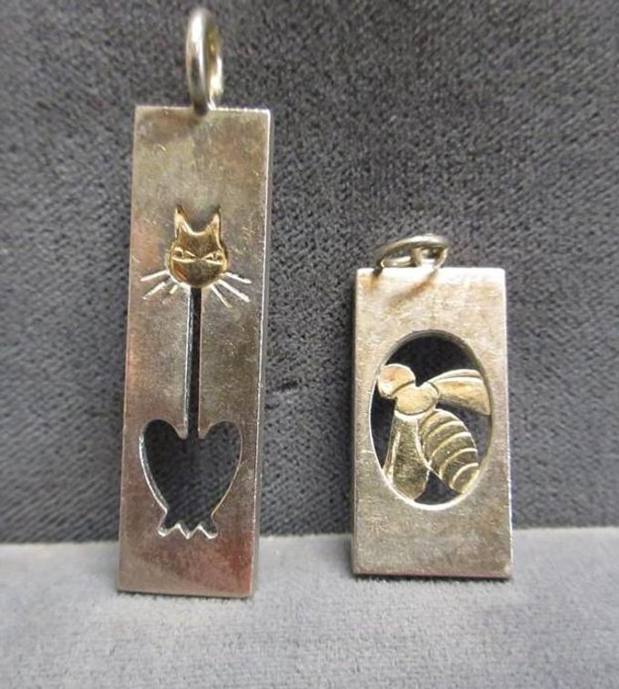 (2) 925 marked pendants
