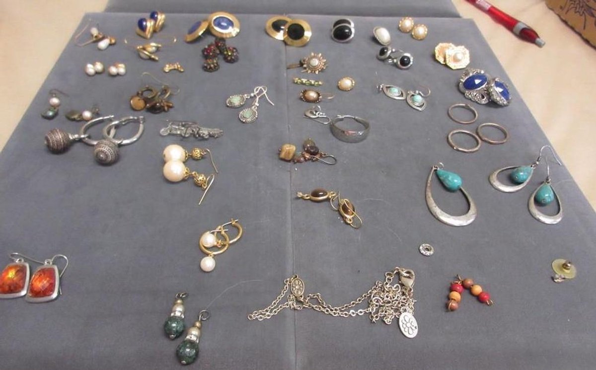 Small box with contents of earrings