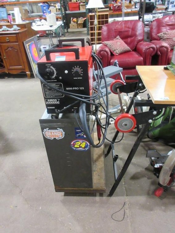 Airco Mini-Pro 125 wire feed welder on rolling cabinet