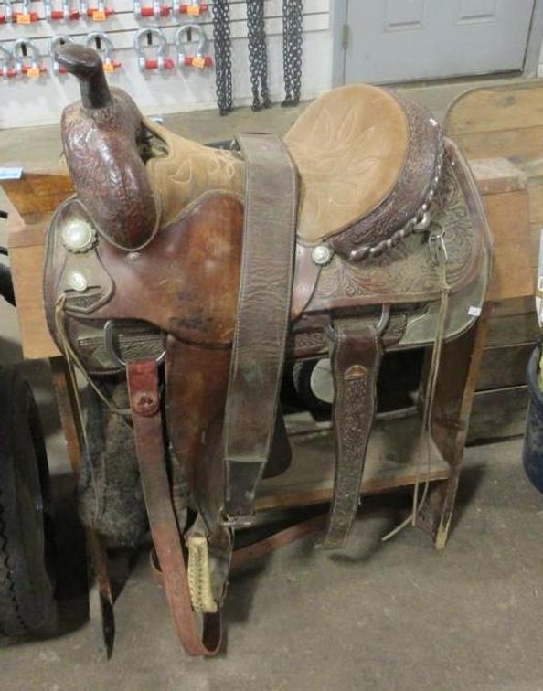Circle Y hand tooled leather saddle (saddle horse not included)