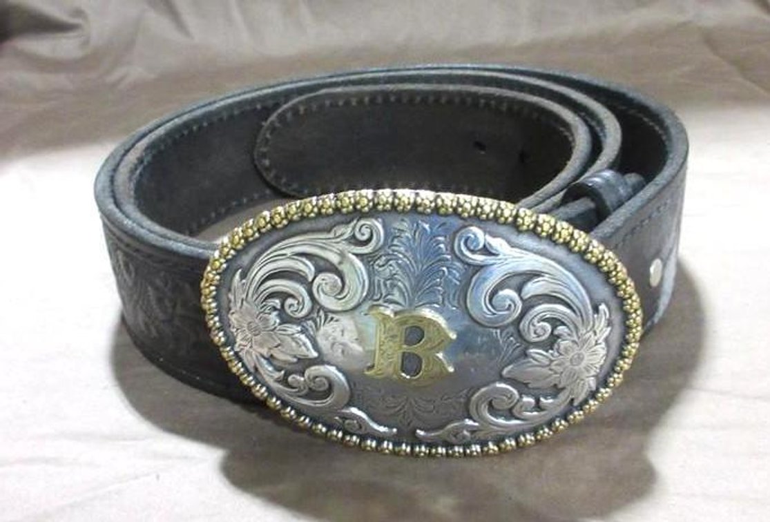 Black leather belt with belt buckle