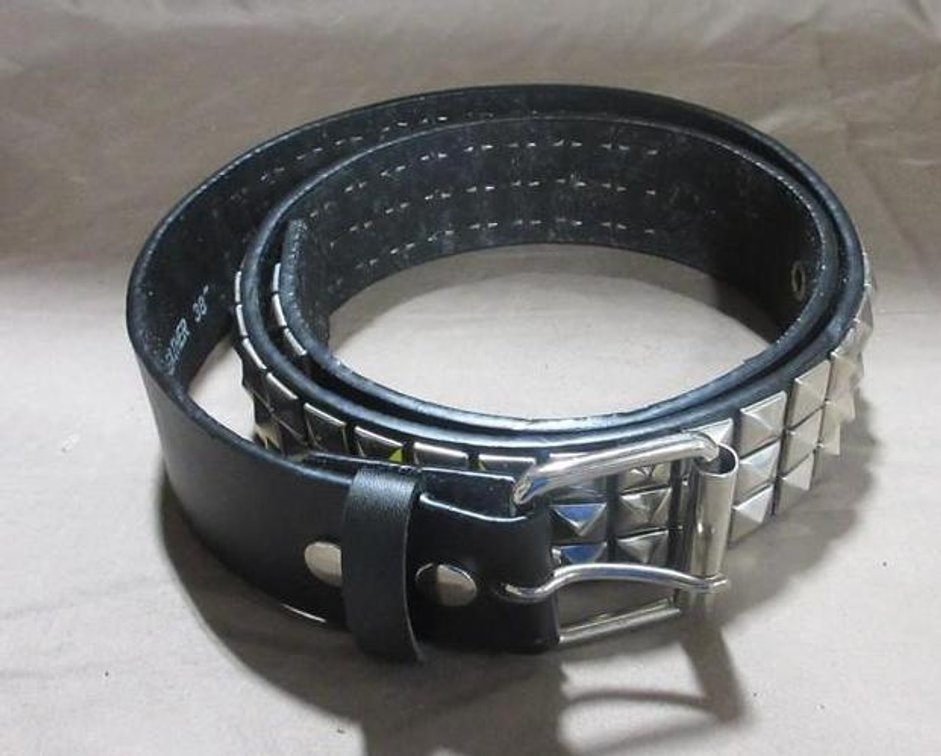 Black leather belt with metal adornment