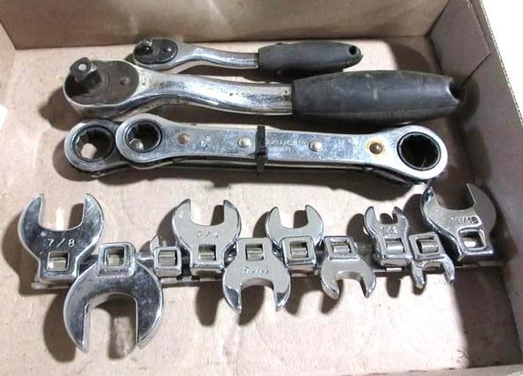 Flat of wrenches and heads