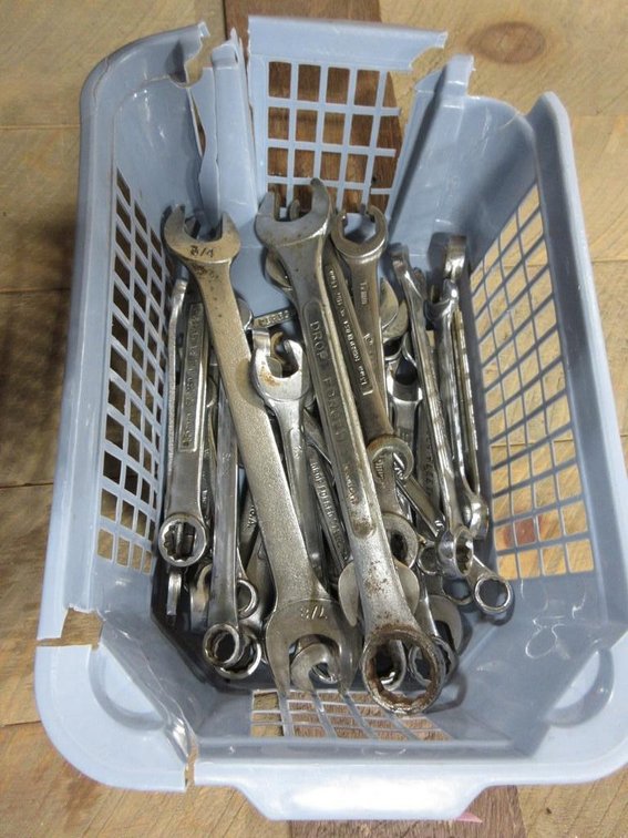 Basket with contents of wrenches