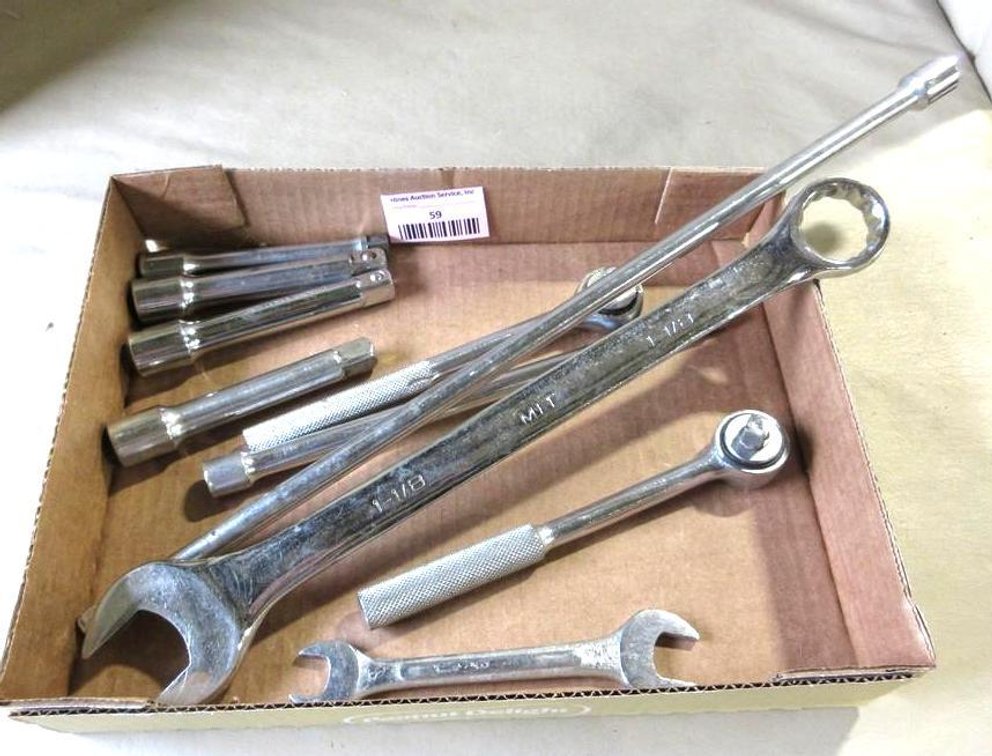 Flat of wrenches and heads