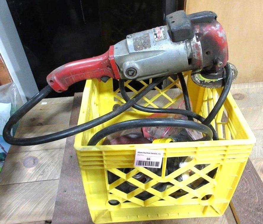 Tote with power grinder and extra heads