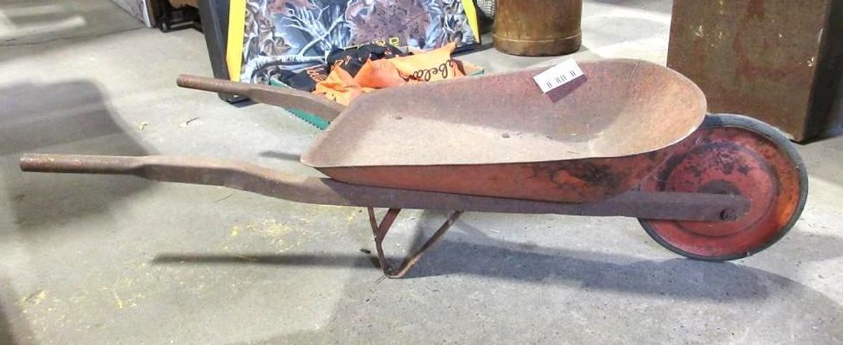 Vintage metal child's wheel barrow