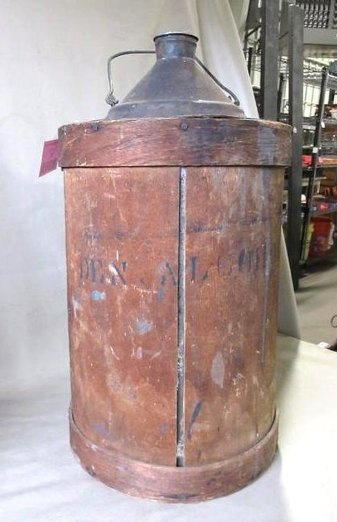 Vintage tin can with handle and barrel wrapping