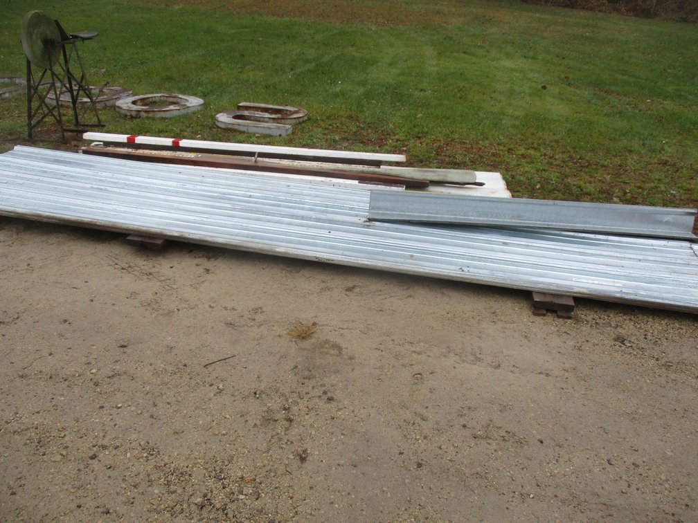 Group of galvanized steel pole shed siding