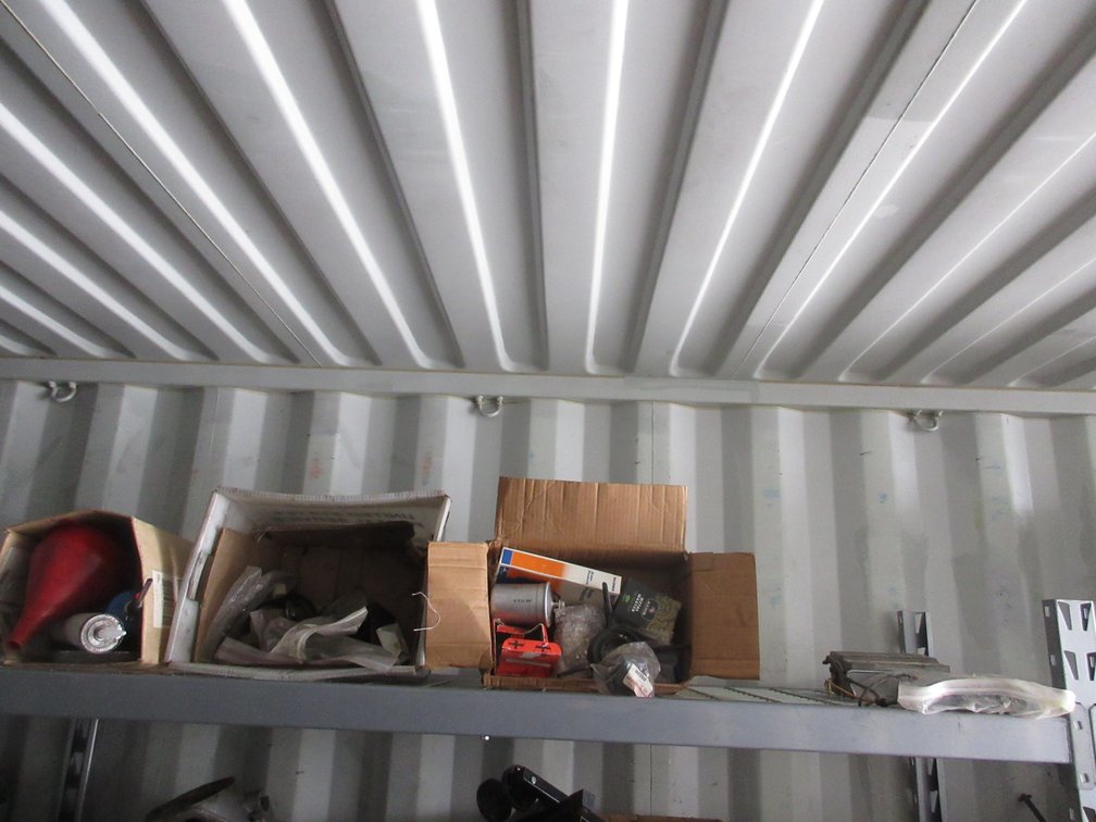 Group of auto parts on shelf