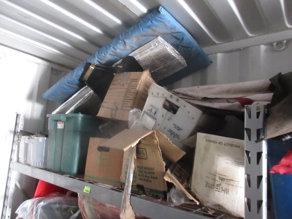 Group of auto parts on shelf