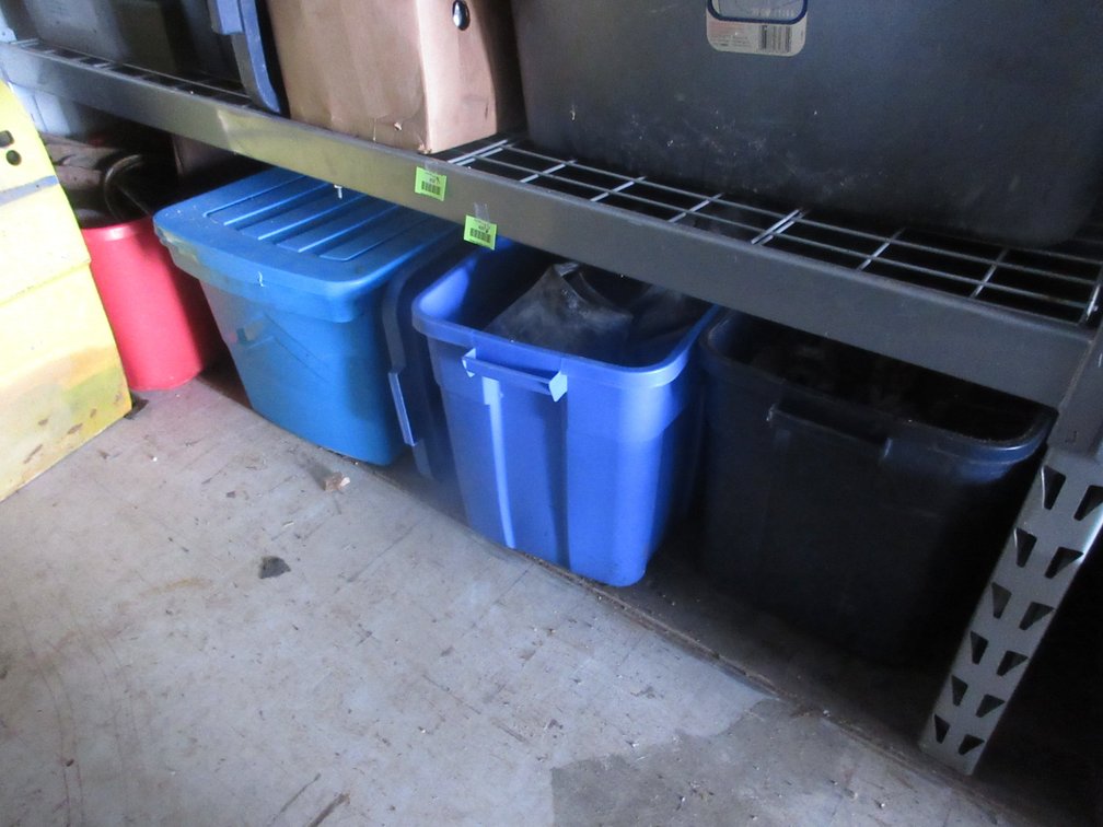 Group of auto parts on floor