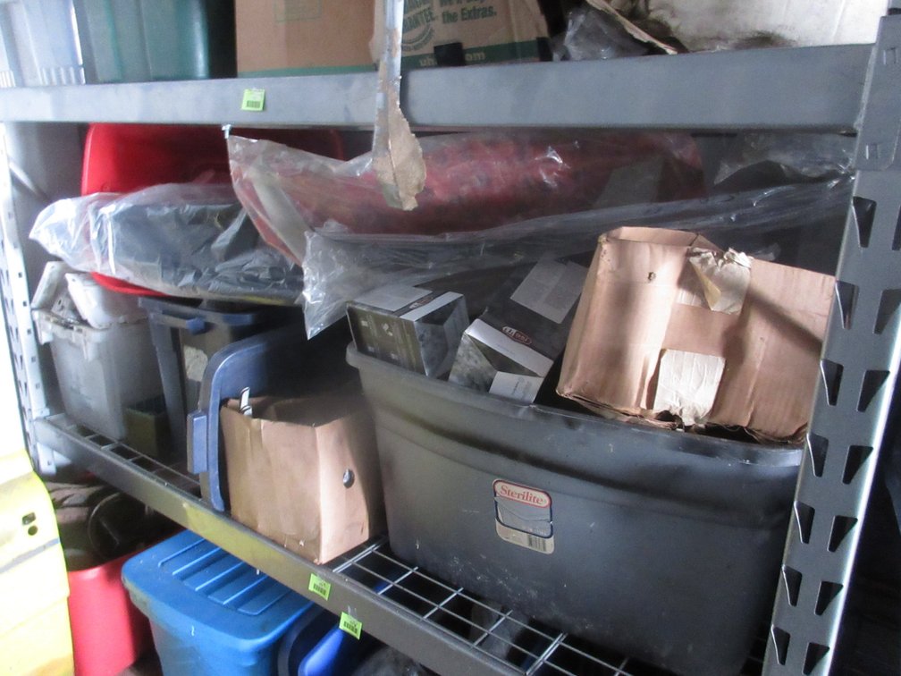 Group of auto parts on shelf