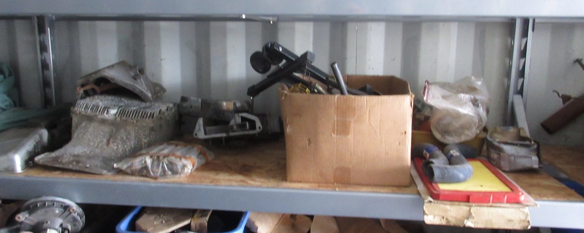 Group of auto parts on shelf