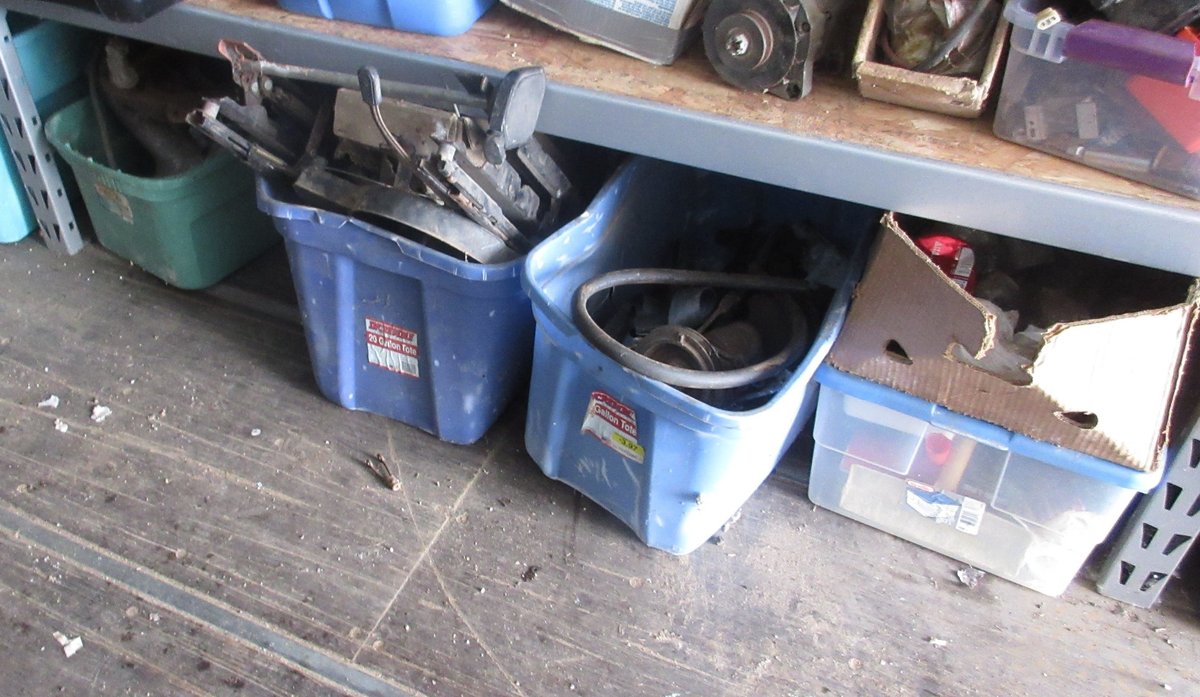 Group of auto parts on floor
