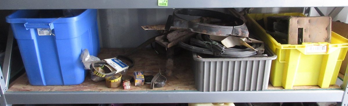 Group of auto parts on shelf