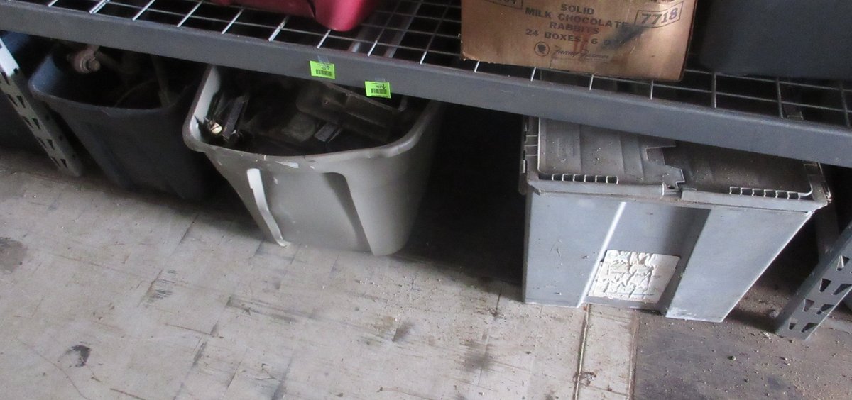 Group of auto parts on floor