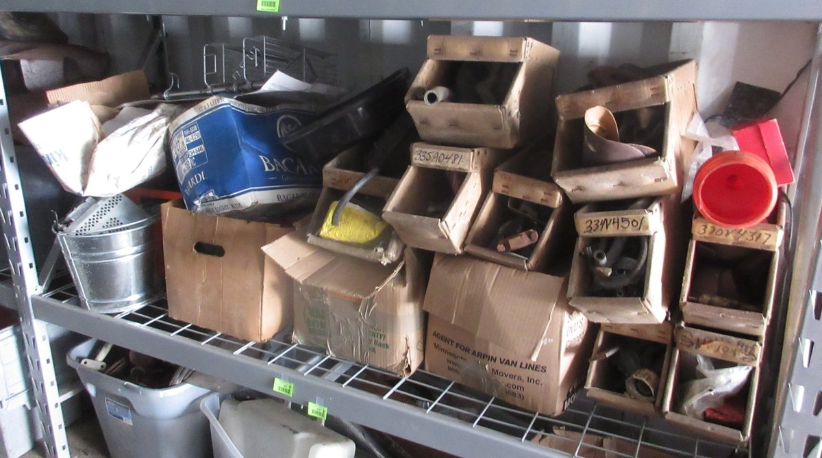 Group of auto parts on shelf