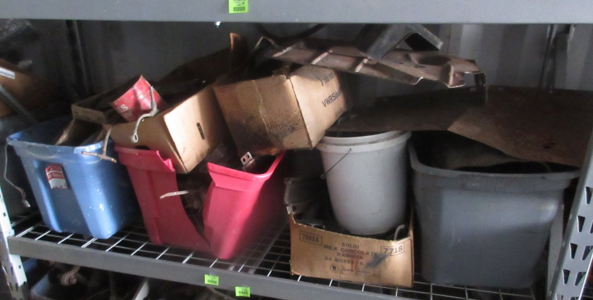 Group of auto parts on shelf