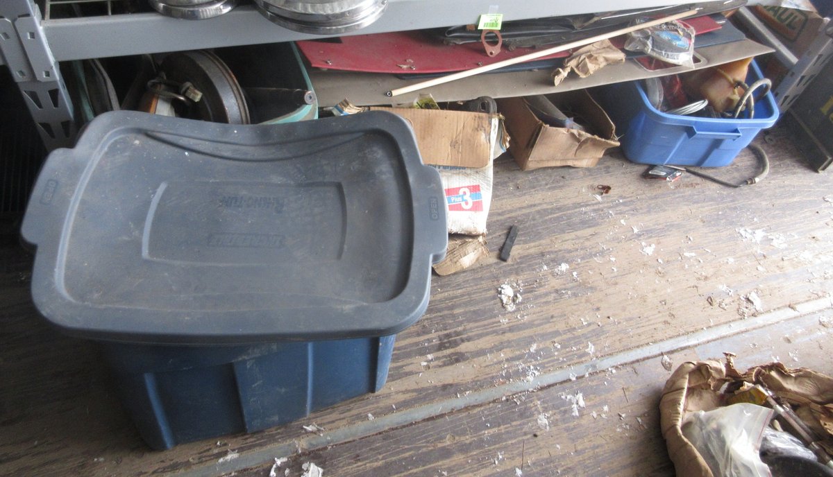 Group of auto parts on floor