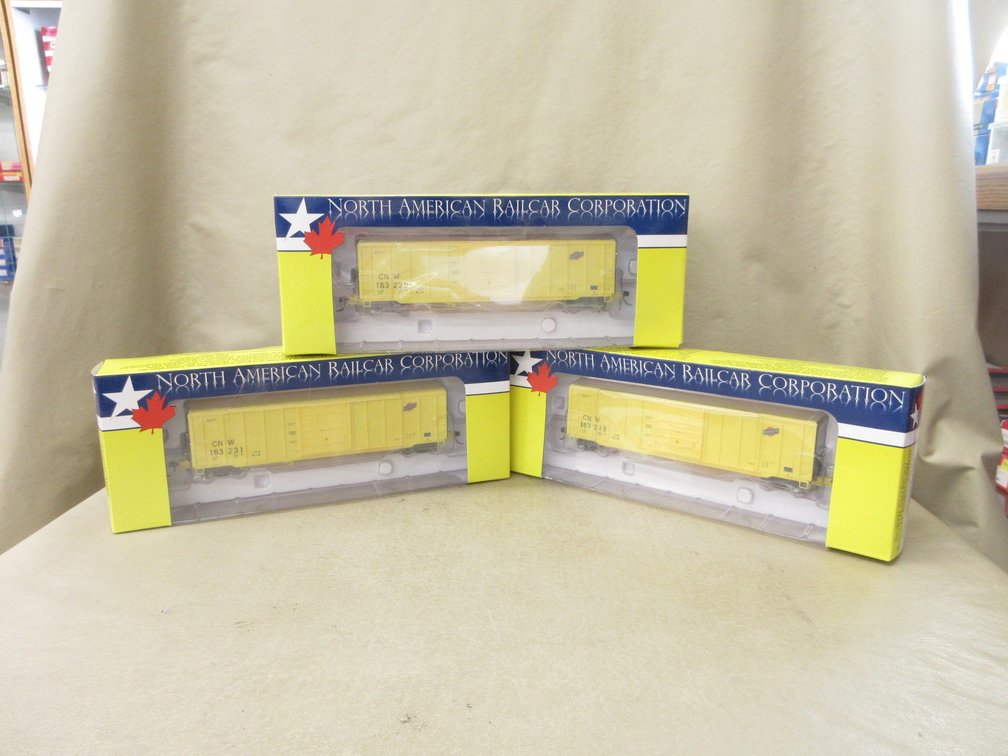 (3) North American Railcar HO scale train cars