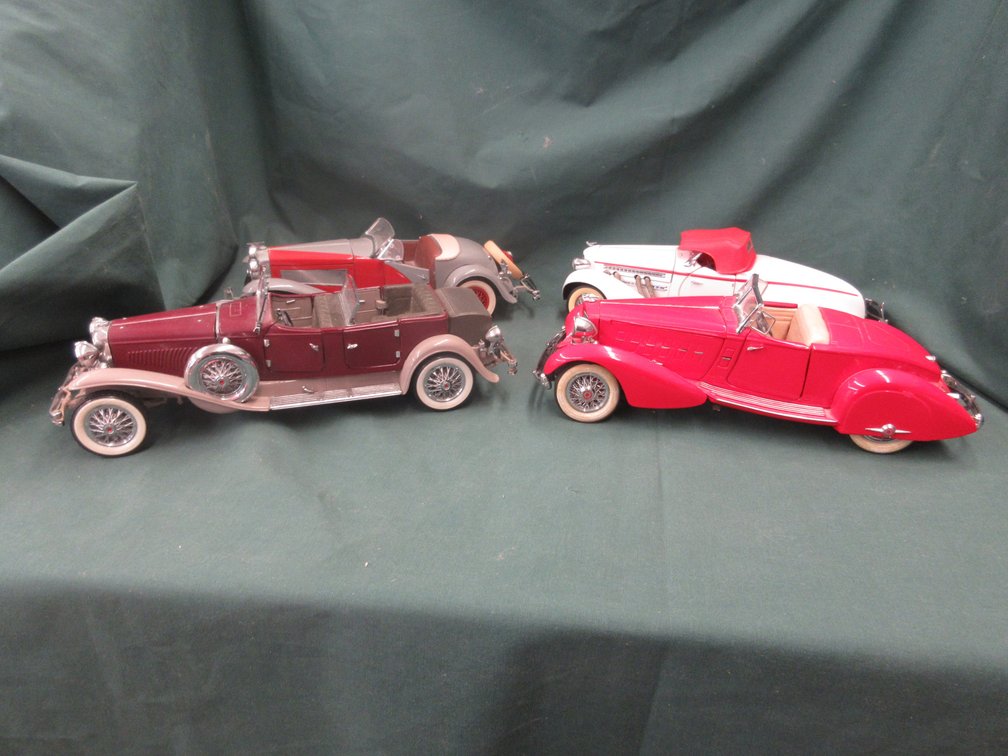(4) Danbury Mint die cast cars