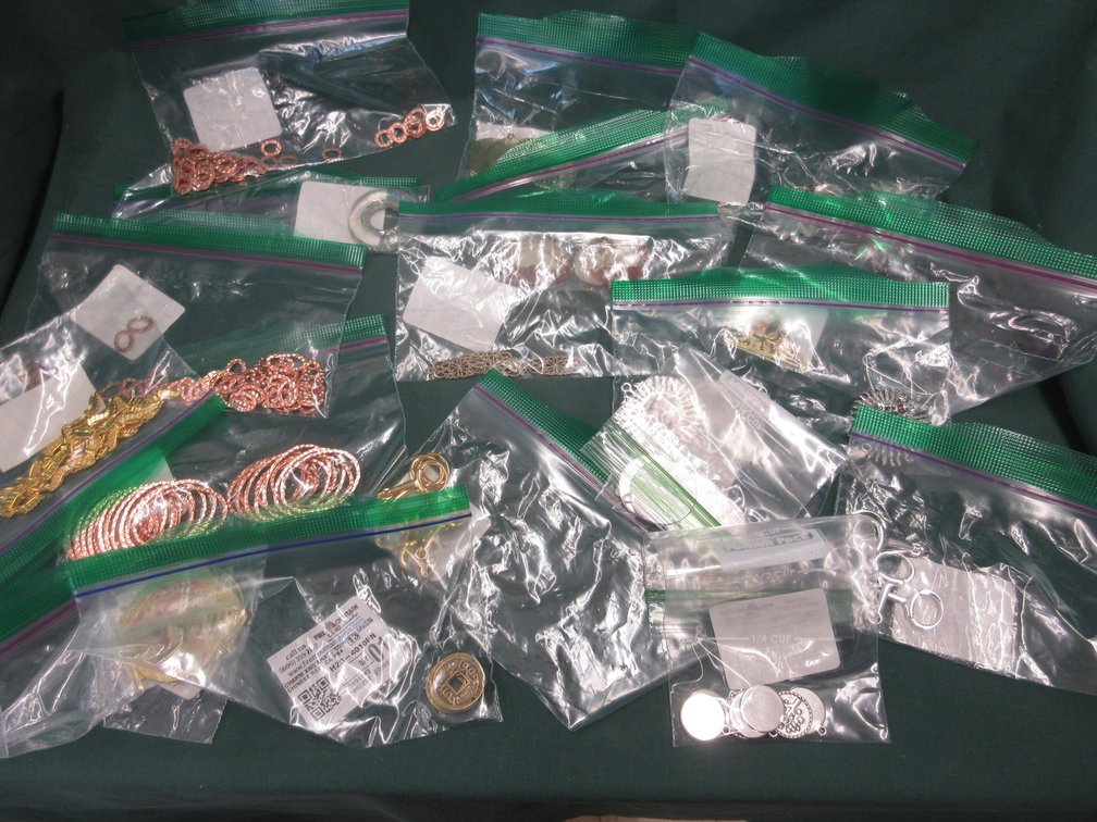 Assorted metal jewelry-making charms