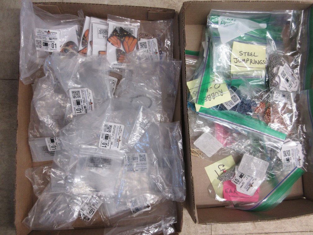 (2) Boxes of jewelry-making supply