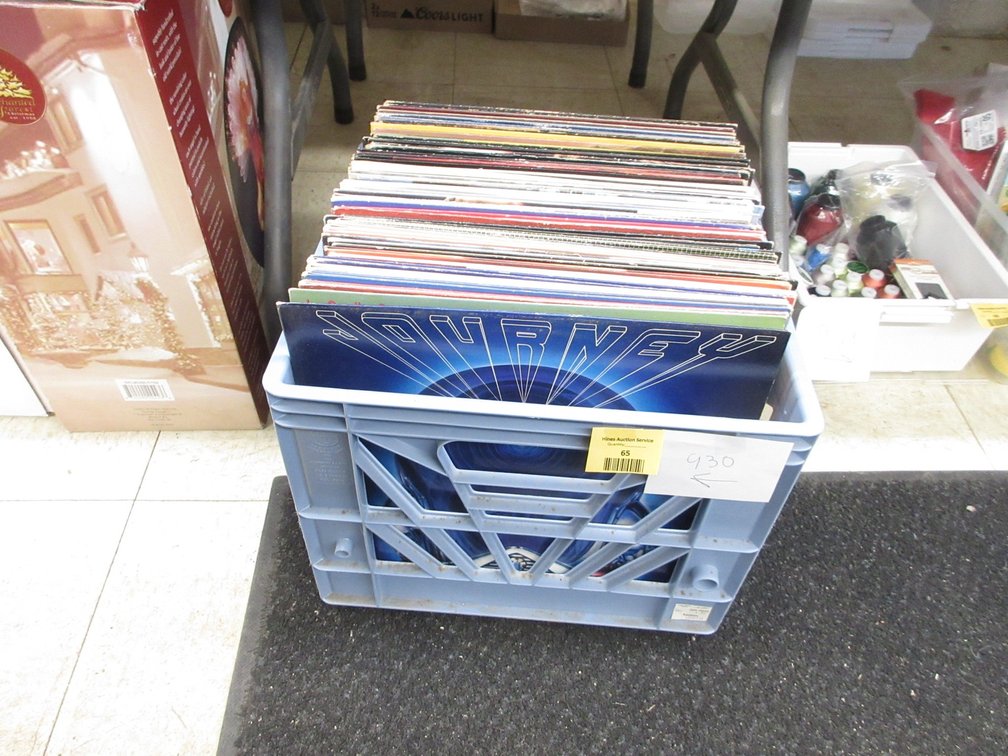 Plastic crate of 33 rpm record albums