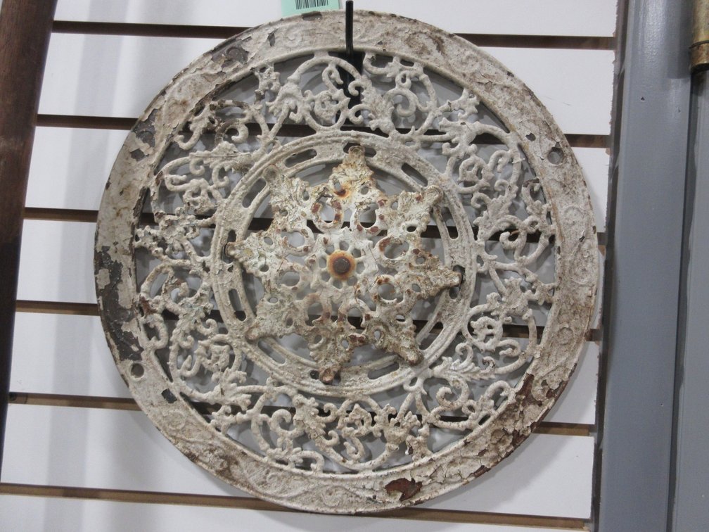 Ornamental cast iron register grate