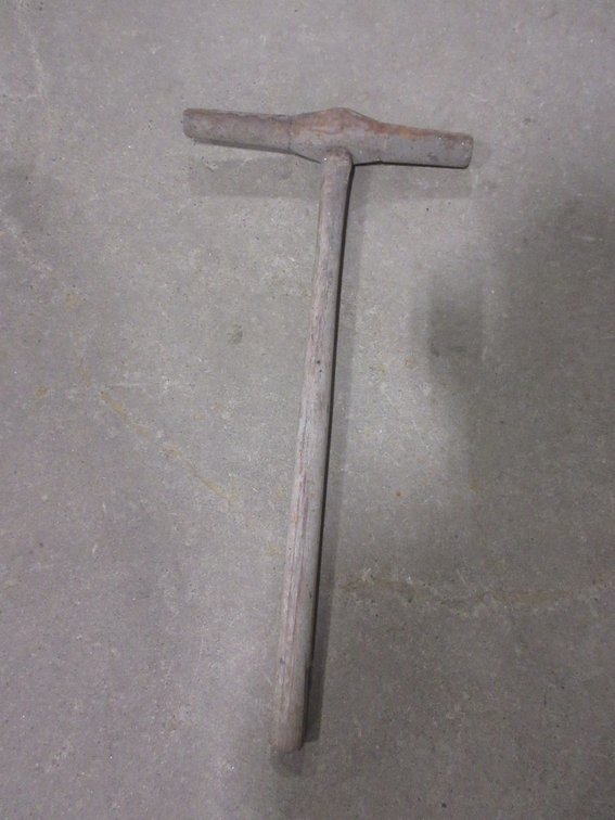 Slug-Devil railroad spike hammer