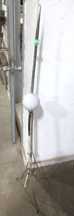 Antique copper lighting rod with milk glass ball