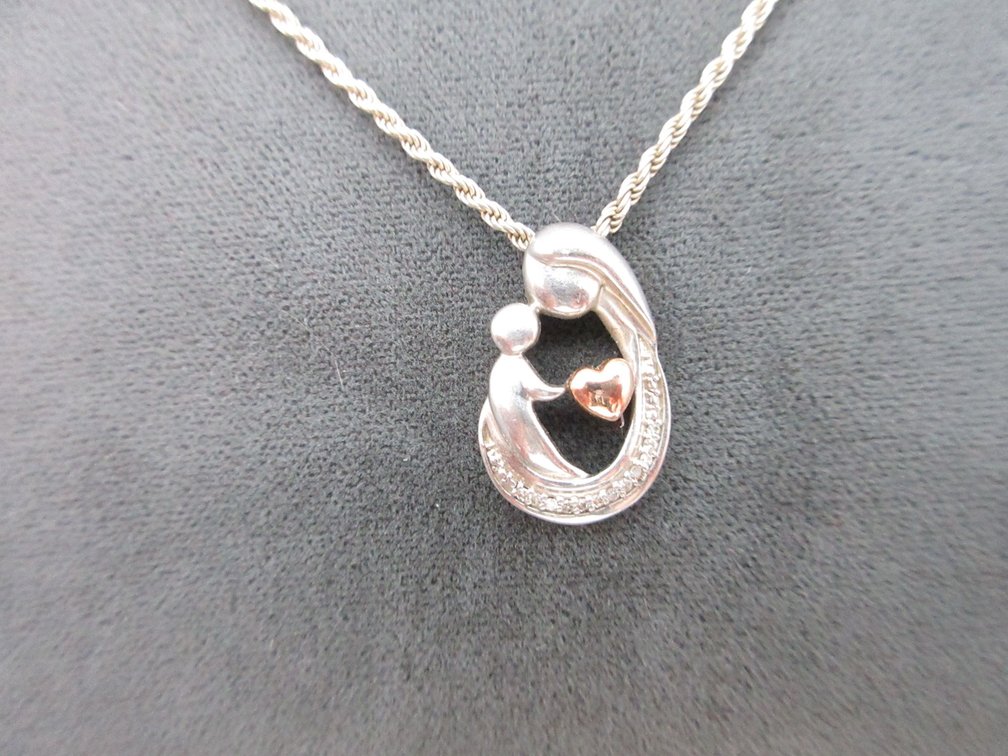 .925 Marked 16" necklace with marked .925 mother and child pendant
