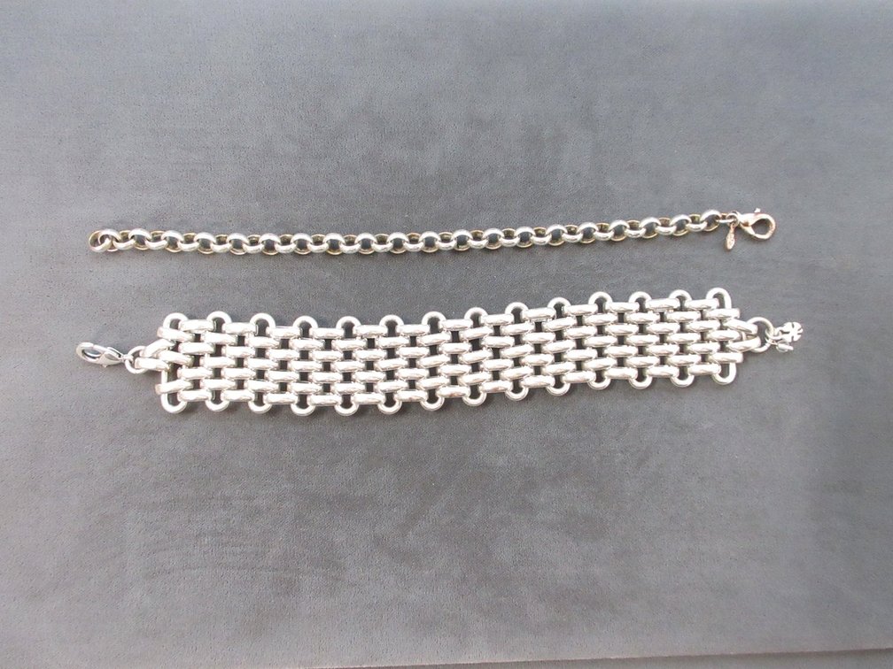 (2) Unmarked silver link bracelets