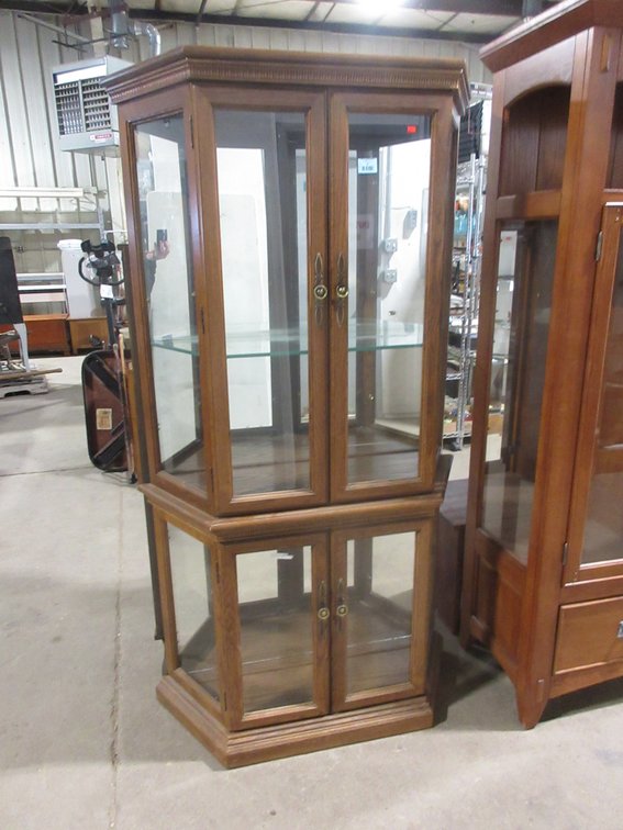 Two piece wooden curio cabinet