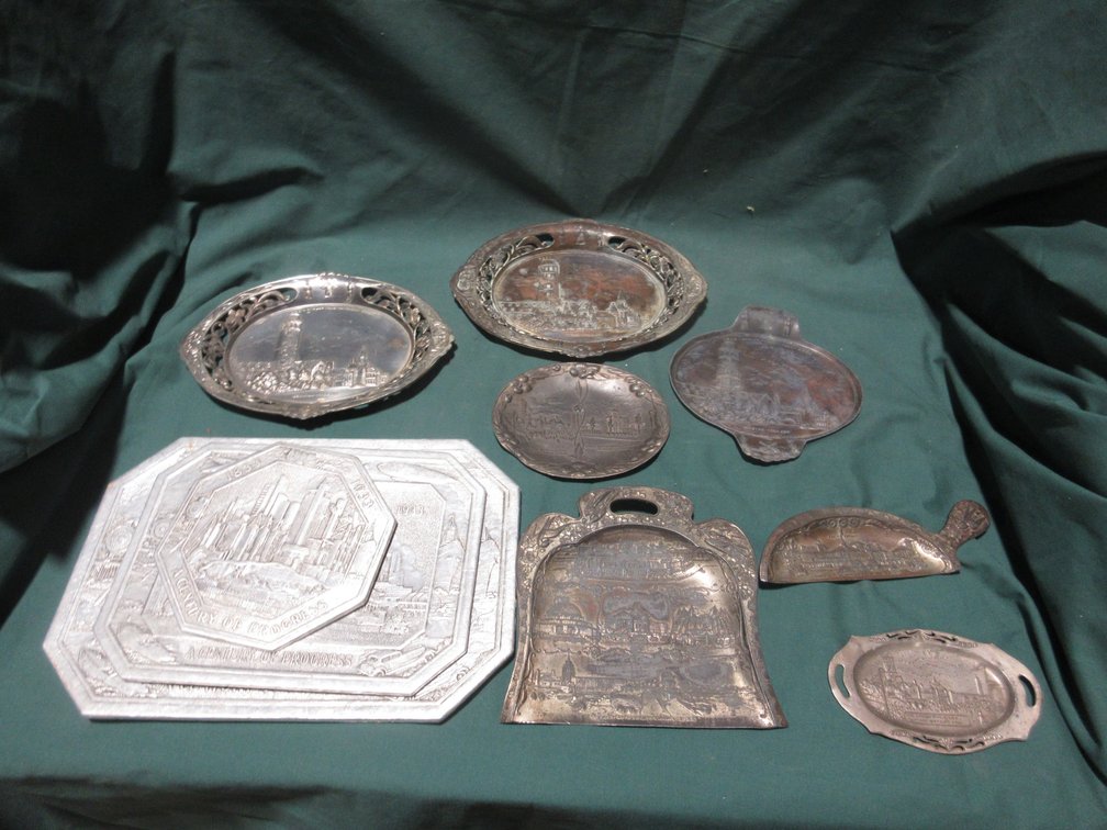 Group of advertising plaques and trays