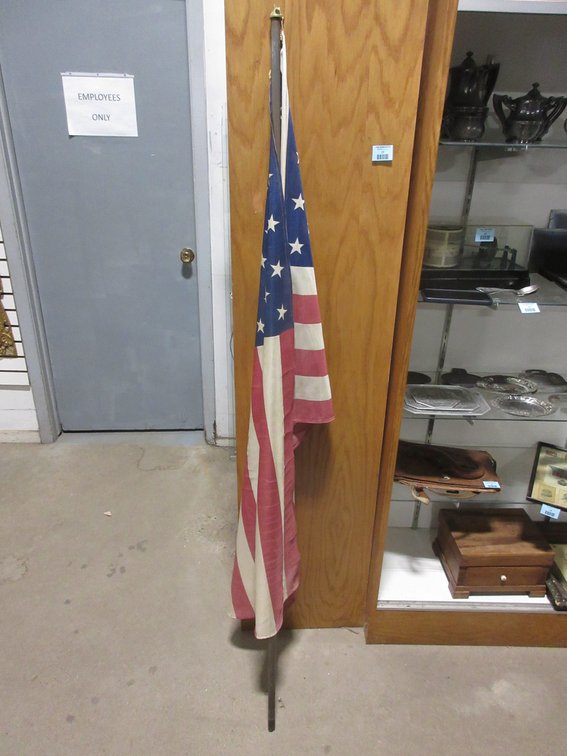Cloth "50" Stars American flag on pole