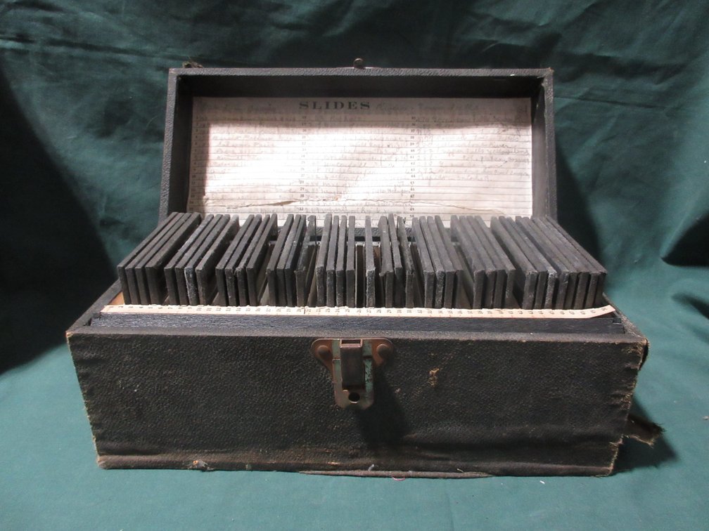 Vintage photo slide box with contents