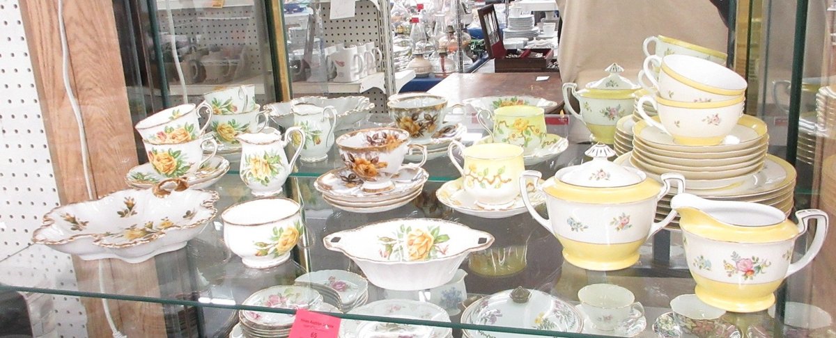 Shelf  of porcelain dinnerware