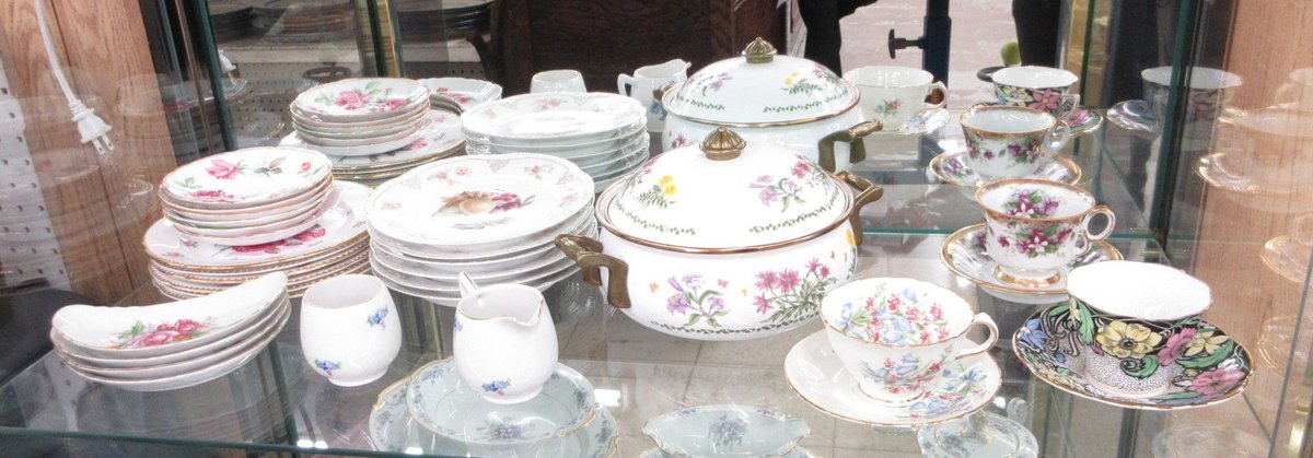 Shelf  of porcelain dinnerware