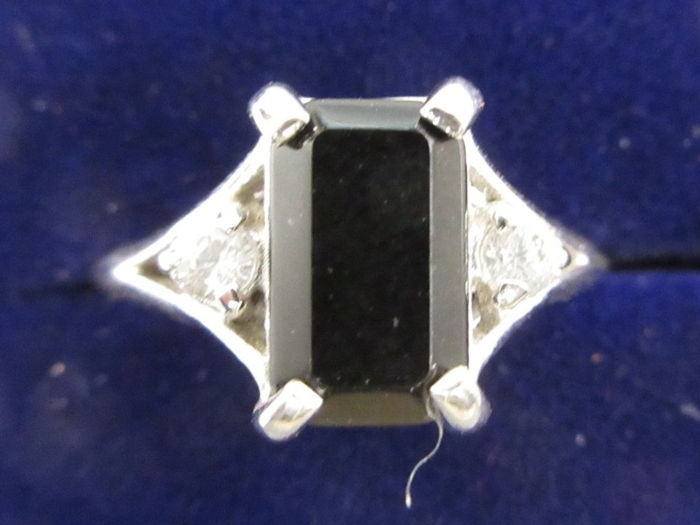 Sterling silver ring with black stone