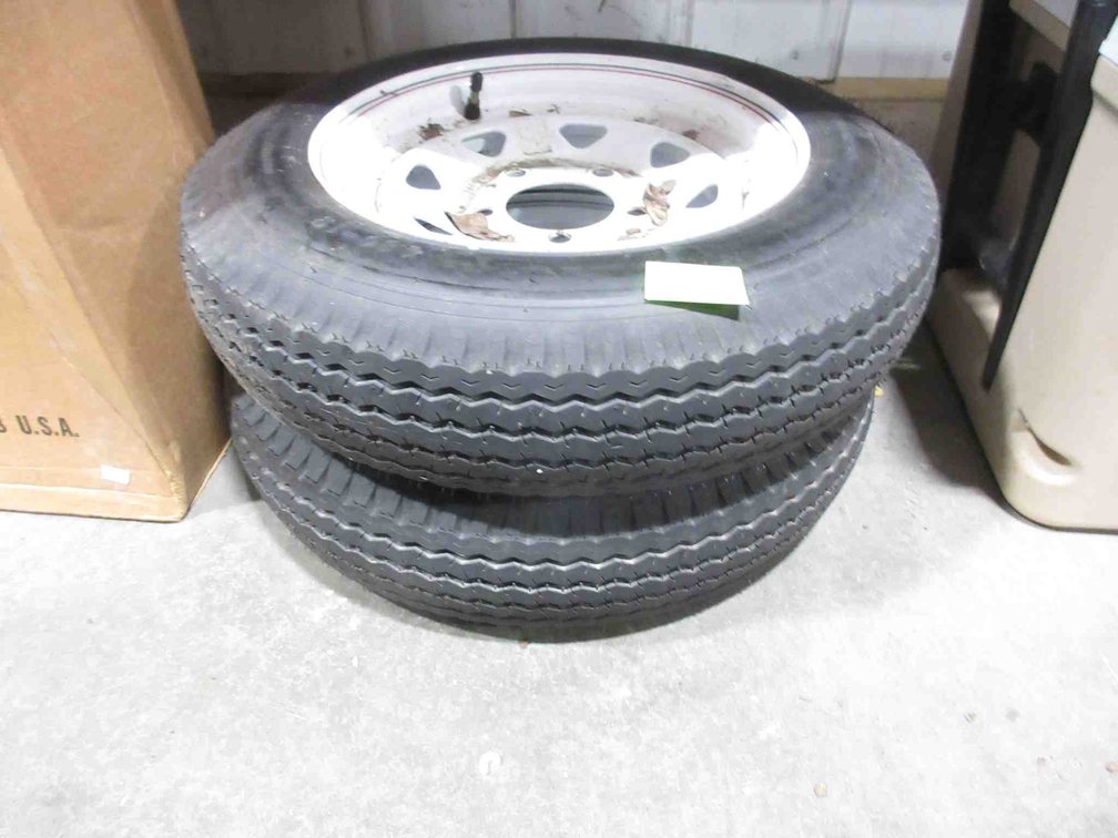 (2) Small trailer tires on 5-bolt rims