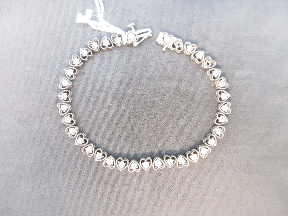 .925 "JD" heart link bracelet with clear stone accent